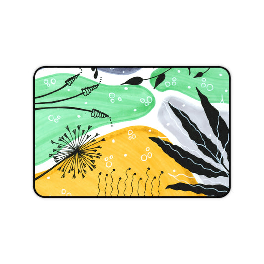A Little Nature leaf print on a large desk mat and mouse pad